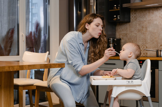 Mother feeding her baby
