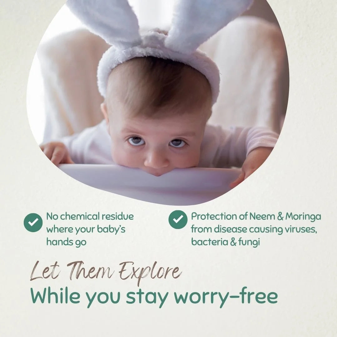 Baby wearing bunny ears on a light background with text highlighting product benefits like no chemical residue and protection from disease-causing viruses