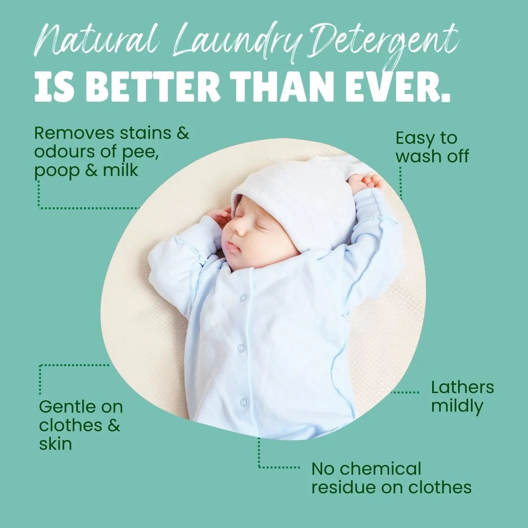 Marketing image featuring a sleeping newborn baby in light blue clothing against a cream background. Text reads "Natural Laundry Detergent IS BETTER THAN EVER" with benefit points around the image: "Removes stains & odours of pee, poop & milk," "Easy to wash off," "Lathers mildly," "Gentle on clothes & skin," and "No chemical residue on clothes.