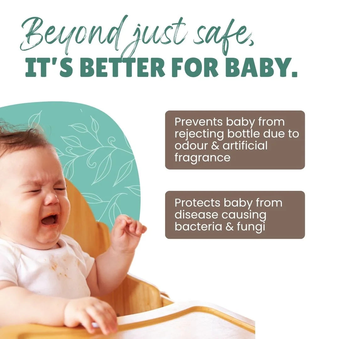 Image of a crying baby with text "Beyond just safe, IT'S BETTER FOR BABY." Lists two key benefits: "Prevents baby from rejecting bottle due to odour & artificial fragrance" and "Protects baby from disease causing bacteria & fungi."