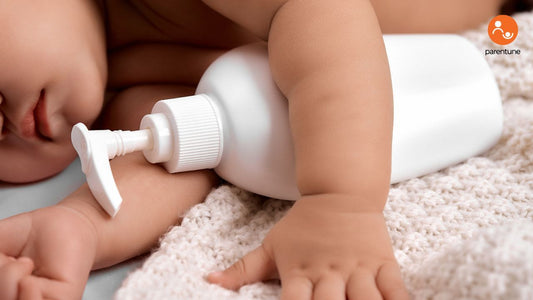 Mother applying moisturizer to baby skin during gentle care routine