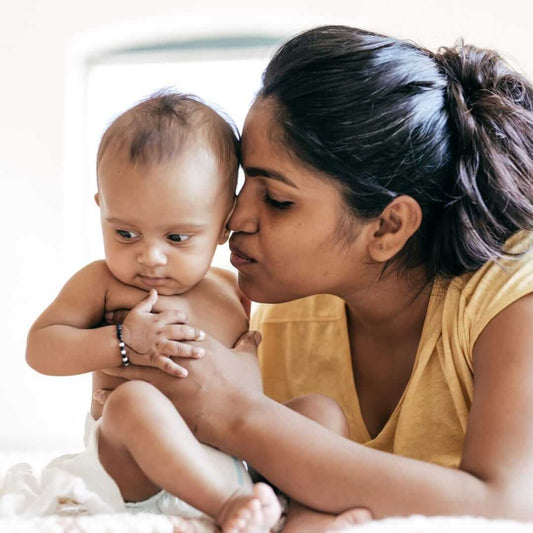 Mother holding a baby 