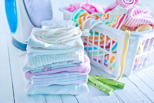Baby clothes drying in monsoon laundry routine