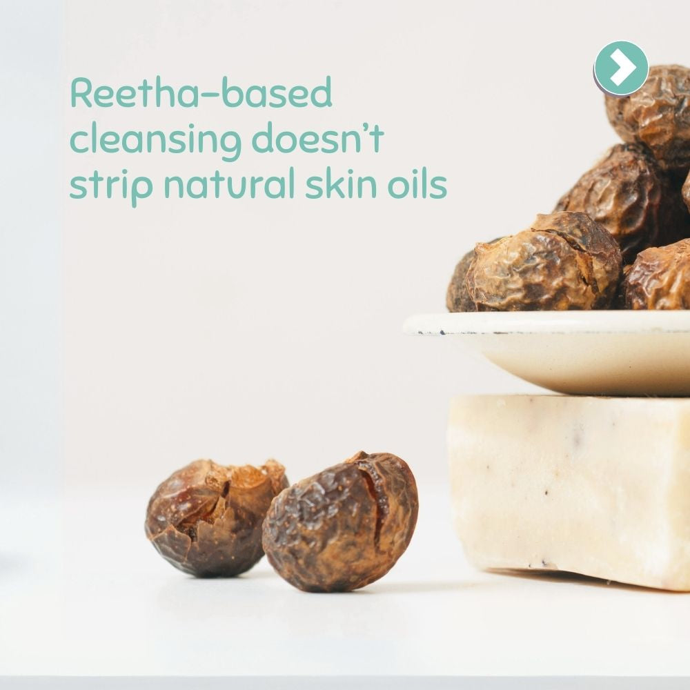 Close-up of Reetha fruits with a text overlay on a light background