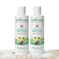 Two bottles of indimums natural baby body wash on a white background