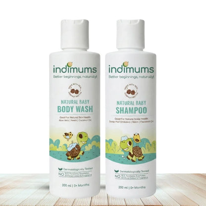 Two bottles of Indimums Natural Baby Shampoo and Body Wash on a wooden surface with a white background