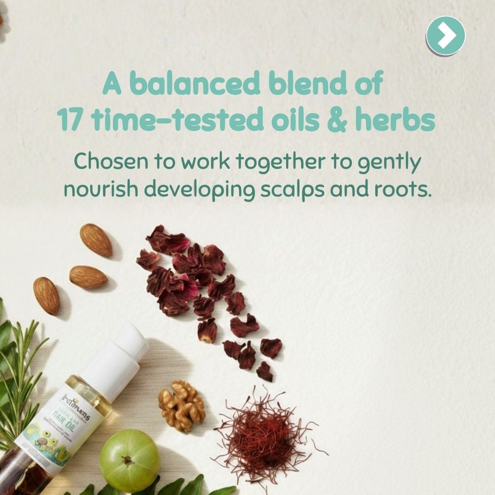 Indimums Natural baby hair oil made with 17 time-tested oils and herbs to gently nourish developing scalps and support healthy hair growth