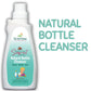 White bottle of "The Indi Mums" Natural Bottle Cleanser with teal label featuring soapnut, shikakai, and basil ingredients. The 500ml bottle has a pump dispenser and shows cartoon illustration of a child with toys. Text highlights it's tough on milk film and odour, low lather, and easy to wash off.