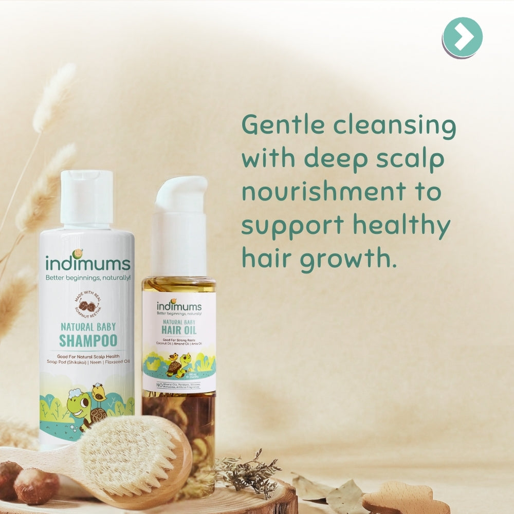Indimums baby shampoo and hair oil with a wooden brush on a neutral background