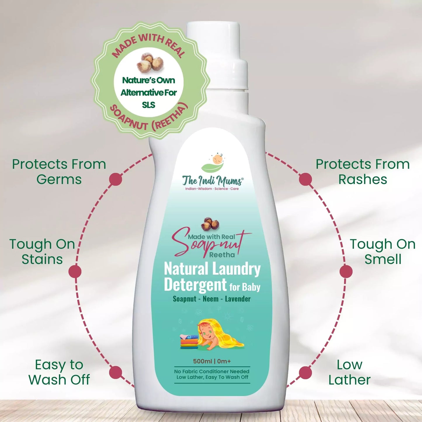 A bottle of The Indi Mums Natural Laundry Detergent for Baby, made with Soapnut, Neem, and Lavender. The product is gentle, effective, and free from harsh chemicals. It is suitable for babies and toddlers, and requires no fabric conditioner. The detergent is tough on stains and smells, easy to wash off, and helps protect baby's skin from germs and rashes.


